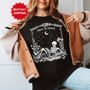Read in Peace T-Shirt, Skeleton Reading Book Lover Tee, Bookish Halloween Shirt for Spooky Season,Book Lover Halloween Shirt