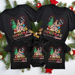 May include: Black t-shirts with a Christmas Mickey Mouse design. The shirts say "Christmas Squad" and have the names "Mommy", "Daddy", "Big", "Little", and "Prince" on them.
