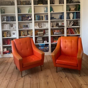 Armchairs in Poltrona Frau style