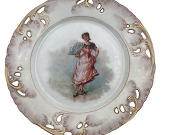 Plato decorativo Limoges Haviland & Co pintado a mano con abanico femenino y borde perforado.