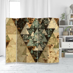 May include: A room divider screen with a geometric pattern of triangles in shades of brown, beige, and green. The screen is made of four panels and is standing on a wooden floor.