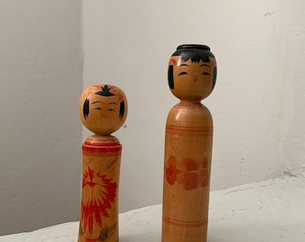 Vintage Kokeshi wooden dolls Japanese wooden carvings, set of 2.
