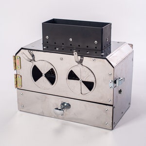 50 kW pellet burner with 62 l pellet hopper! Burner in a stove or boiler. Gravity pellet burner!