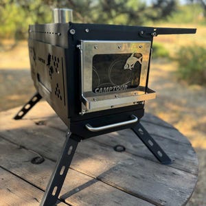 Hot tent stove with chimney. Stove for outdoor camping. Portable stove for the garden or terrace! Wood burner stove! Fireplace for camper!