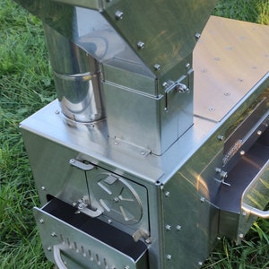 Portable pellet stove with oven and large cooking surface for cooking! Kit with chimney and pellet hopper!