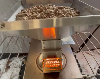 Pellet burner for wood stoves with gravity feed of pellets!