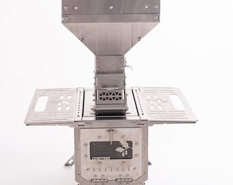 May include: A stainless steel CampTour wood-burning stove, designed for outdoor cooking. It features a rectangular firebox with a door, side shelves, and a funnel-shaped top for fuel. The stove is supported by angled legs.