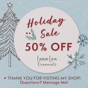 May include: A light blue graphic featuring a stylised dark outline of a Christmas tree and snowflakes. A central white circle contains the text Holiday Sale 50% OFF, Luna Lou Ornaments, and the message THANK YOU FOR VISTING MY SHOP! Questions? Message Me!
