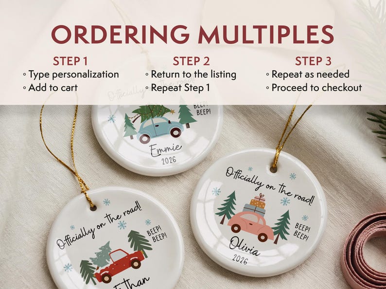 May include: Three round white ceramic ornaments with gold hanging strings. Each features a colourful car illustration, pine trees, snowflakes, and the text "Officially on the road!" and "BEEP! BEEP!". Names and the year 2026 are printed on each ornament.