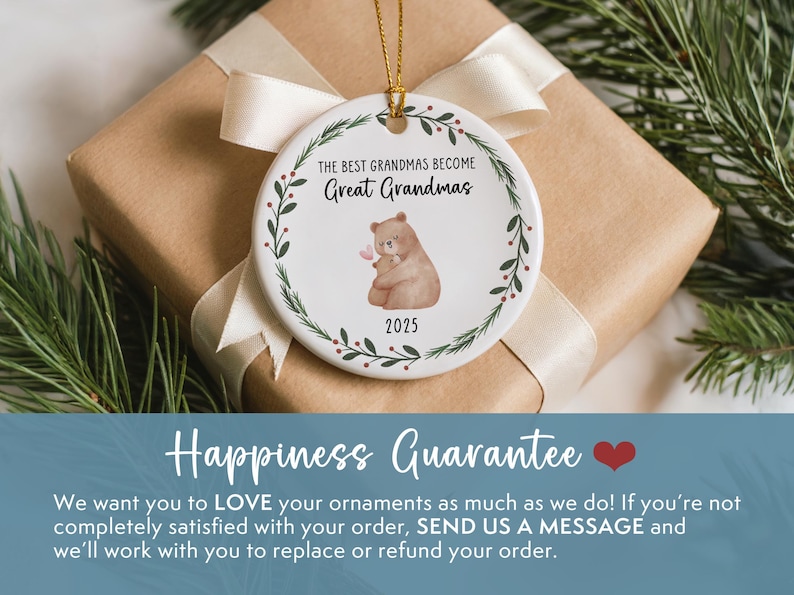 May include: A white ceramic ornament with the text "THE BEST GRANDMAS BECOME Great Grandmas" and a bear illustration. The ornament is decorated with a green leaf border and the year 2025. It is presented on a wrapped gift.