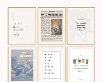 May include: Six framed art prints with gold frames. The prints feature quotes and imagery, including the text "IT'S A LOVE STORY YES", "IM A MIRRORBALL", "I'm a crumpled up piece of paper lying here", "baby places", "NEVER BE SO KIND, YOU FORGET TO BE CLEVER", and coffee cups.