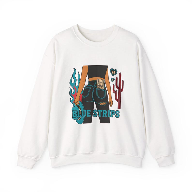May include: White sweatshirt with a graphic print of a woman wearing blue jeans with a dollar bill in the back pocket. The graphic also includes a cactus, flames, and the text "BLUE STRIPS".