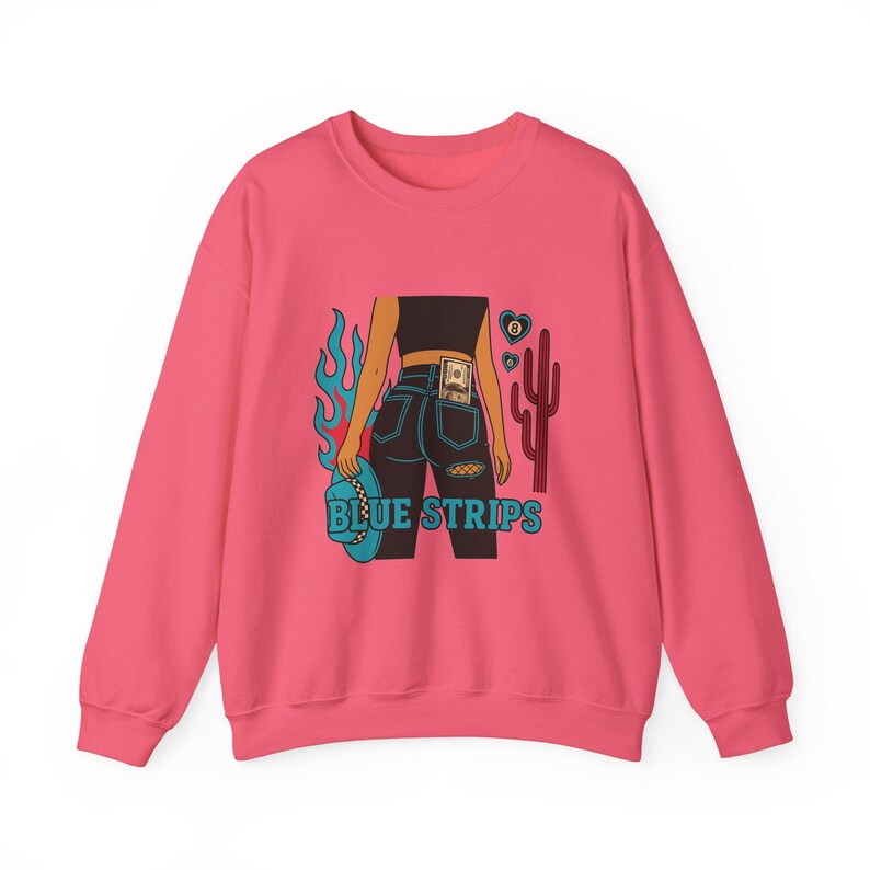May include: Pink sweatshirt with a graphic of a woman in blue jeans with a dollar bill in her back pocket, flames, a cactus, and the text "BLUE STRIPS".