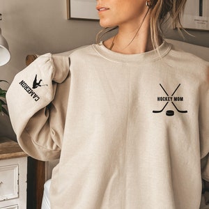 Custom Hockey Mom Sweatshirt with Name on Sleeve, Personalized Ice Hockey Mama Sweatshirt, Game Day Hoodie, Gift for Hockey Mom