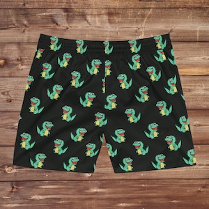 Zwarte herenzwemshort met groene cartoon dinosaurusprint grappige zomerbroek voor zwembadfeest of strandvakantie-badmode