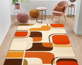 May include: A rectangular area rug featuring a repeating geometric pattern of rounded squares and interlocking shapes in shades of orange, dark brown, tan, and cream. The design consists of solid color blocks and curved lines on a light background.