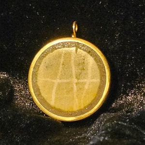 Brass and stone circle pendant