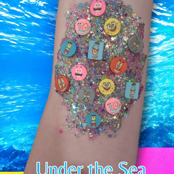 Under the sea friend hair and body glitter in a blue pink and yellow glitter with polymer clay slices of spongebob characters in size 3/5 gm