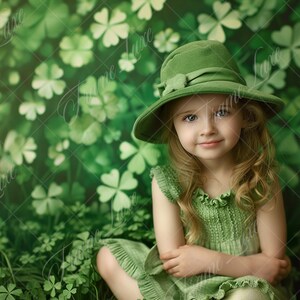 May include: A young person wearing a green dress and hat, sitting in a field of clovers. The background is a lush green with a pattern of four-leaf clovers. The image has a soft, dreamy quality.