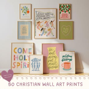 May include: Collection of framed Christian wall art prints. The prints feature colorful illustrations and inspirational quotes. The artwork includes images of flowers, mermaids, and abstract designs. The text includes phrases like "Come Holy Spirit" and "Jesus Turns Our Mourning Into Joyful Dancing!"