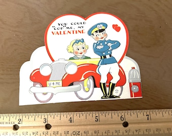 May include: Vintage Valentine's Day card featuring a red car with the text "U 4 ME." A cartoon police officer in a blue uniform and a girl are in front of a heart with the text "YOU COULD 'COP ME, MY VALENTINE."