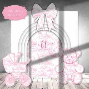 May include: A pink safari-themed backdrop design featuring a baby carriage, teddy bear, and bow. The backdrop has a pink and white safari animal pattern. The text "PINK SAFARI BACKDROP" is displayed on a pink label. The design includes the text "lt LADES DESIGN".