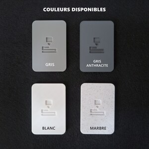 May include: Four colour swatches showing available colours for a product. The colours are grey, anthracite grey, white, and marble.
