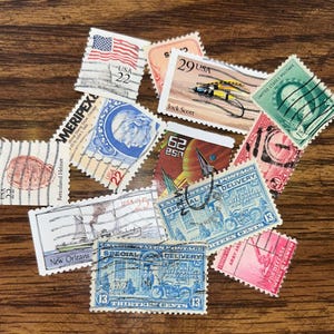 12 pack of assorted vintage stamps from the 80s and 90s.