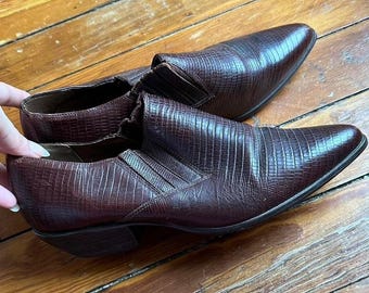 Botines Sabree de piel vintage con punta afilada.