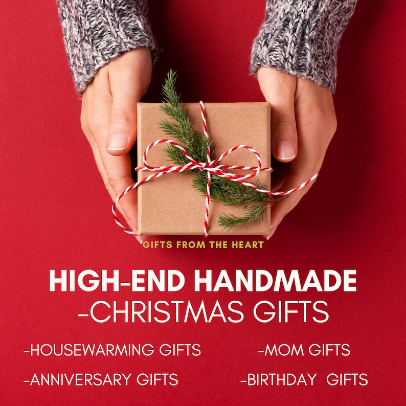 May include: A brown gift box tied with red and white twine and a sprig of evergreen. The box is being held by two hands. The text "GIFTS FROM THE HEART" is below the box. The text "HIGH-END HANDMADE -CHRISTMAS GIFTS" is below the text "GIFTS FROM THE HEART". The text "-HOUSEWARMING GIFTS" is below the text "HIGH-END HANDMADE -CHRISTMAS GIFTS". The text "-ANNIVERSARY GIFTS" is below the text "-HOUSEWARMING GIFTS". The text "-MOM GIFTS" is below the text "-ANNIVERSARY GIFTS". The text "-BIRTHDAY GIFTS" is below the text "-MOM GIFTS".