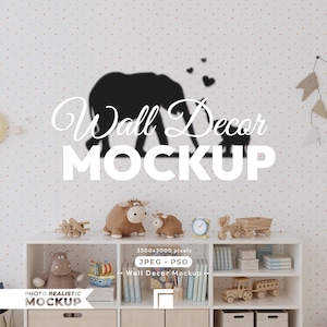 May include: A white wall featuring a black silhouette decal of an adult elephant and a calf with three small hearts above them. The wall is decorated with small orange and grey dots and a hanging banner of triangular flags on the right side.