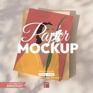 May include: A vertical paper mockup featuring a woman with a flower, in shades of red, yellow, and brown. The words "Paper MOCKUP" are prominently displayed in white. Additional text includes "3000x3000 pixels" and "JPEG • PSD".