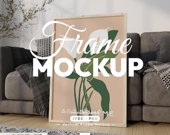 May include: A vertical light wood frame mockup featuring a minimalist illustration of a white calla lily with green leaves on a soft peach background. The text "Frame MOCKUP" is overlaid in large white letters, with "ART BOHÈME" at the bottom.