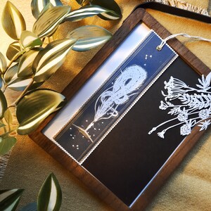 Marque-page dragon en papier découpé fait main : cadeau zéro déchet pour les amateurs de lecture