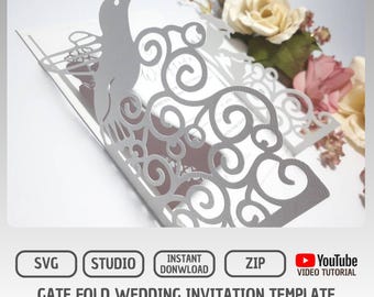 May include: A white gate fold wedding invitation template featuring a hummingbird design. The invitation has intricate cut-out details and decorative swirls. The text "GATE FOLD WEDDING INVITATION TEMPLATE HUMMINGBIRD" is displayed at the bottom.