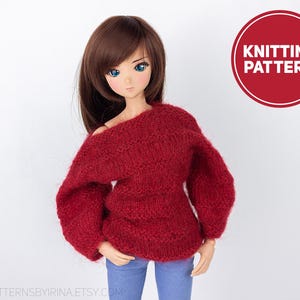 Op de afbeelding: Een rode gebreide trui met een losse, off-shoulder stijl. De trui is gemaakt van zacht, pluizig garen en heeft een ontspannen pasvorm.