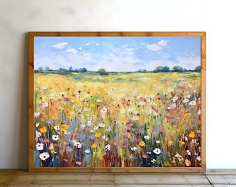 May include: A painting of a field of wildflowers in shades of yellow, pink, white, and blue. The field is set against a backdrop of a bright blue sky with fluffy white clouds. The painting is framed in a natural wood frame.