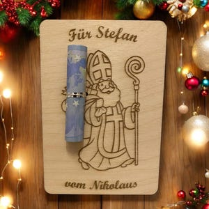 Geldgeschenk zu Nikolaus personalisiert aus Holz - das perfekte Geldgeschenk für die ganze Familie