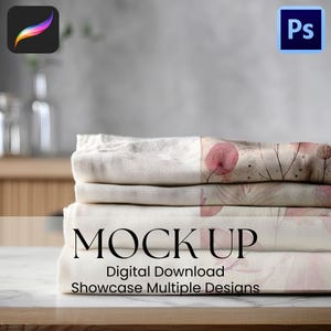 May include: A stack of folded fabric with floral patterns and the word "MOCKUP" in large letters. Below the word "MOCKUP" are the words "Digital Download" and "Showcase Multiple Designs". The image also includes the Procreate and Photoshop logos.