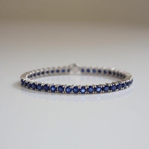Sterling Silver Sapphire Tennis Bracelet: Prong Setting, September Birthstone
