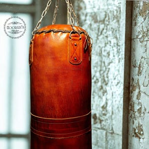 Saco de boxeo clásico de cuero: ideal para entrenamientos de boxeo, kickboxing, MMA y artes marciales. Saco de arena de entrenamiento, saco pesado. El mejor regalo para él.
