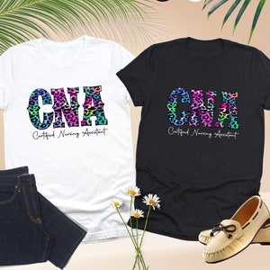 a pair of t - shirts with the word gap on them
