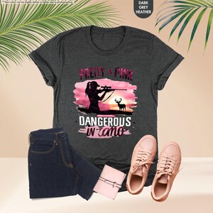 a t - shirt that says, pretty in pink, with a silhouette of a
