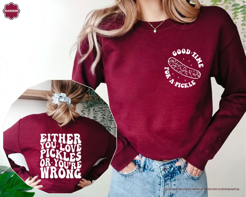 a woman wearing a sweatshirt with a message on it