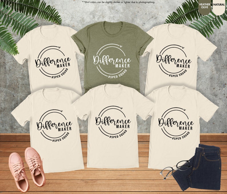 a group of t - shirts with different designs on them