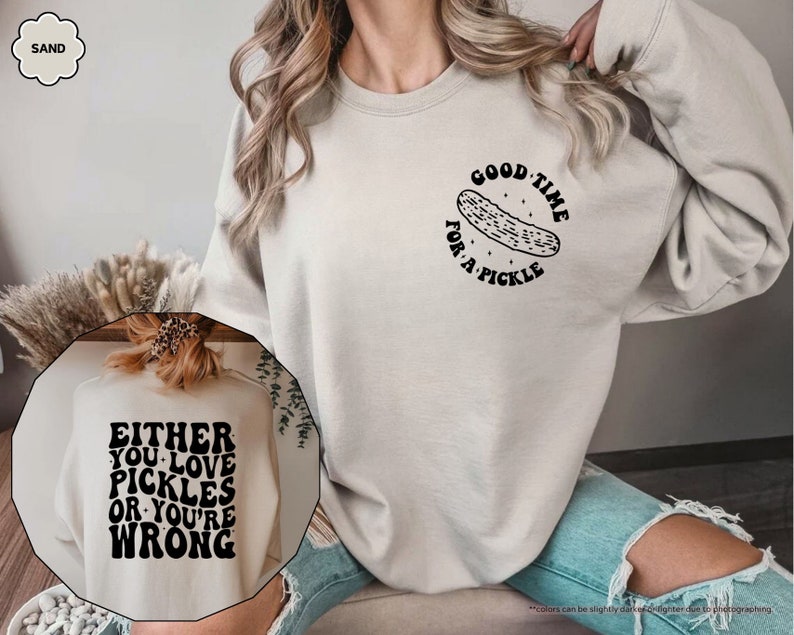 a woman wearing a sweatshirt that says, either you love pickles or you '