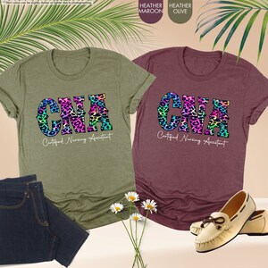 a pair of t - shirts with leopard print on them