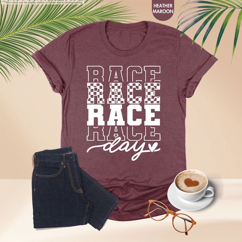 a t - shirt that says race race race class next to a cup of coffee