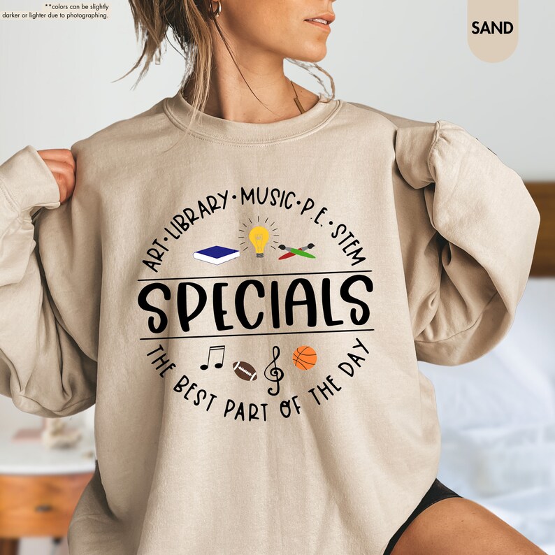 a woman wearing a sweatshirt with the words specials on it