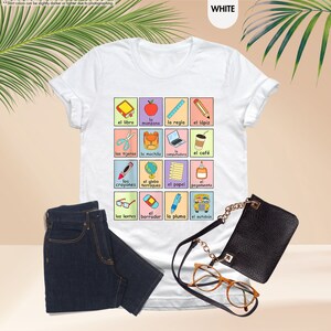 a women's t - shirt with a picture of different items on it